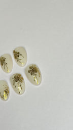 Off white Gold floral nails